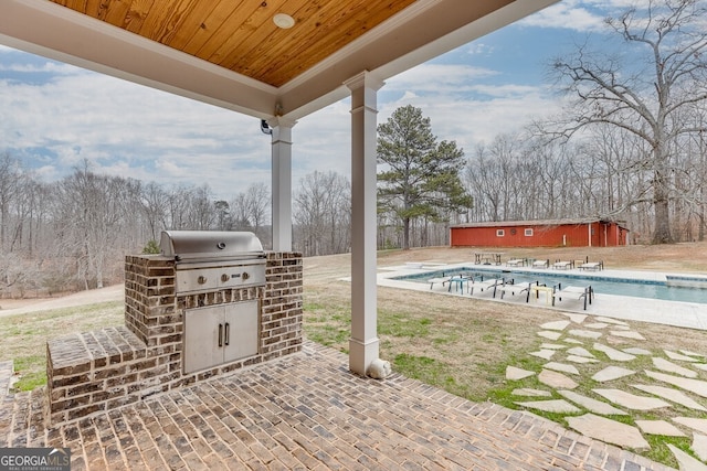 4621 Stanley Rd, Flowery Branch, GA 30542 - view of patio with grilling area, an outdoor pool, and view of wooded area