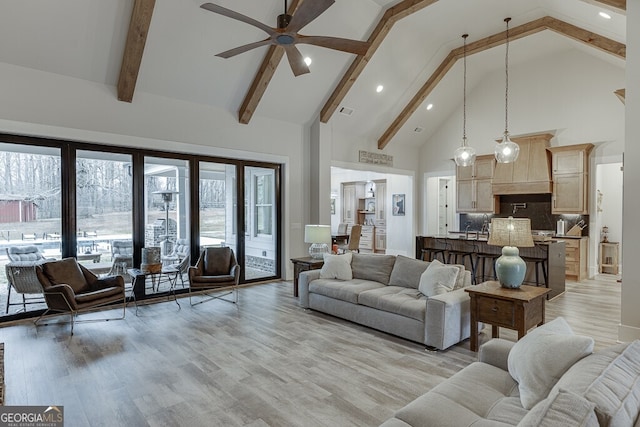4621 Stanley Rd, Flowery Branch, GA 30542 - living area with high vaulted ceiling, a ceiling fan, beamed ceiling, light wood-style floors, and recessed lighting