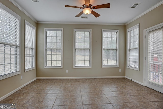 unfurnished sunroom featuring ceiling fan