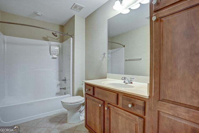 full bathroom featuring shower / bathing tub combination, tile patterned floors, vanity, and toilet