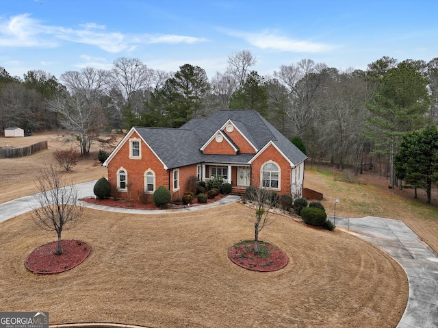 view of front of home with a front lawn