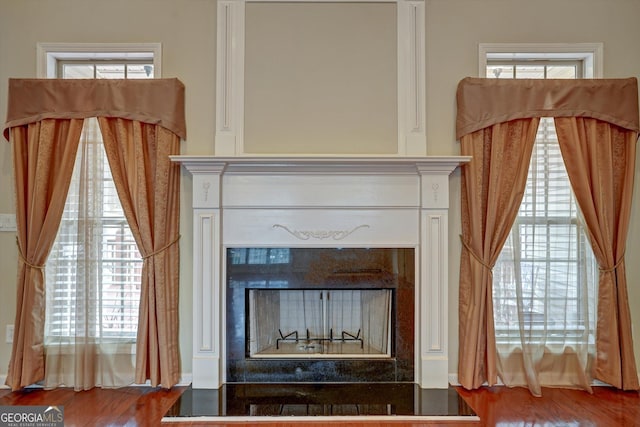 interior details featuring hardwood / wood-style flooring