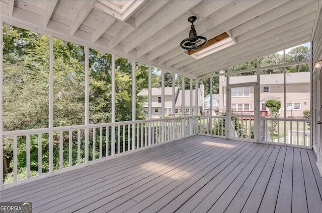 unfurnished sunroom with a wealth of natural light