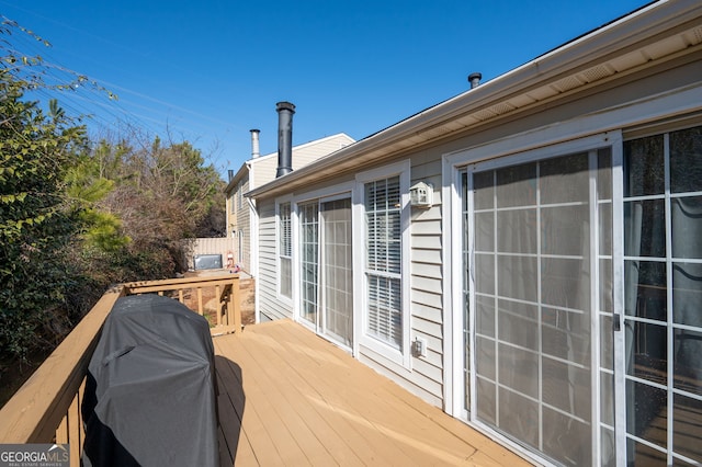 wooden terrace with grilling area