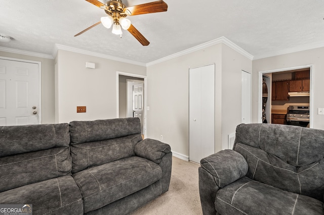 living room featuring light carpet, crown molding, a textured ceiling, and ceiling fan