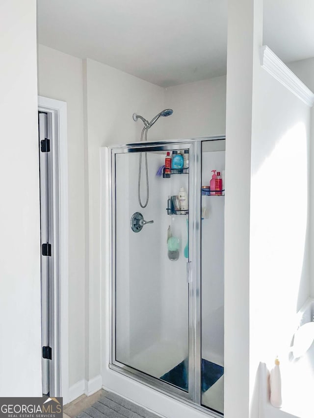 bathroom with an enclosed shower