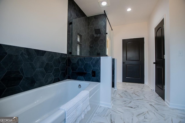 full bath featuring recessed lighting, marble finish floor, a tile shower, and a bath