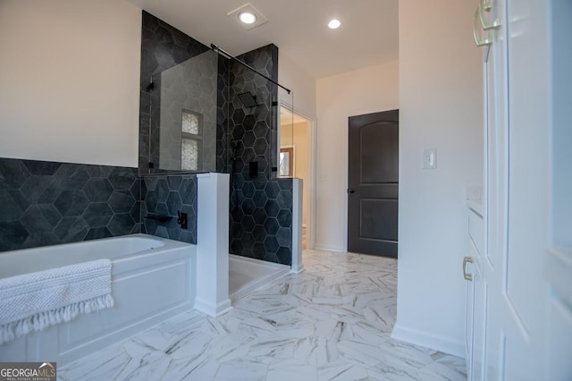 bathroom with a walk in shower, marble finish floor, a bath, and recessed lighting