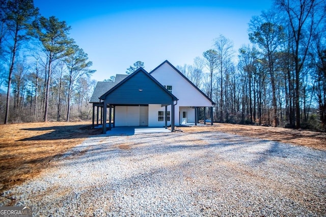 view of front of home with driveway and an attached garage