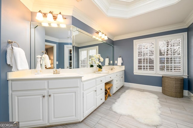 bathroom featuring vanity and ornamental molding