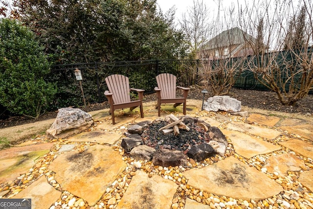 view of patio featuring a fire pit