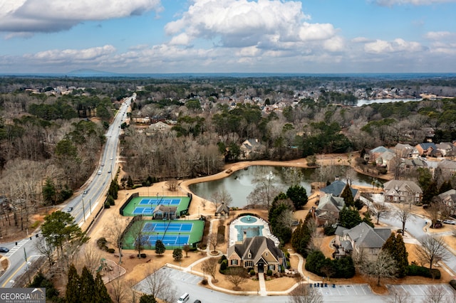 bird's eye view with a water view