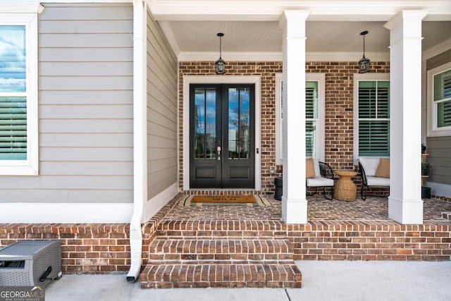 entrance to property featuring french doors