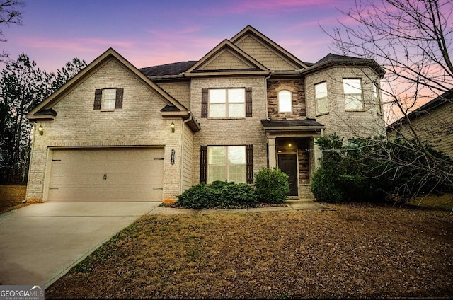 view of front of home with a garage