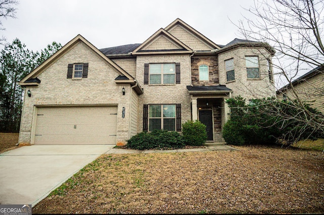 view of front of home with a garage