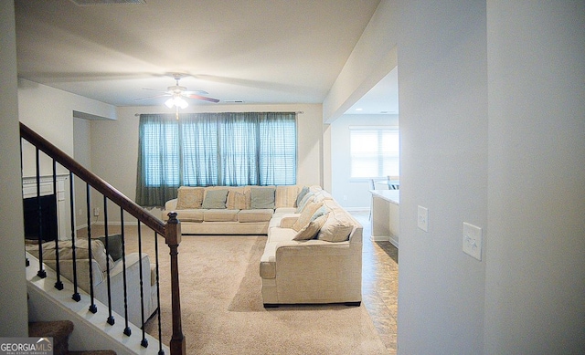 living room featuring ceiling fan