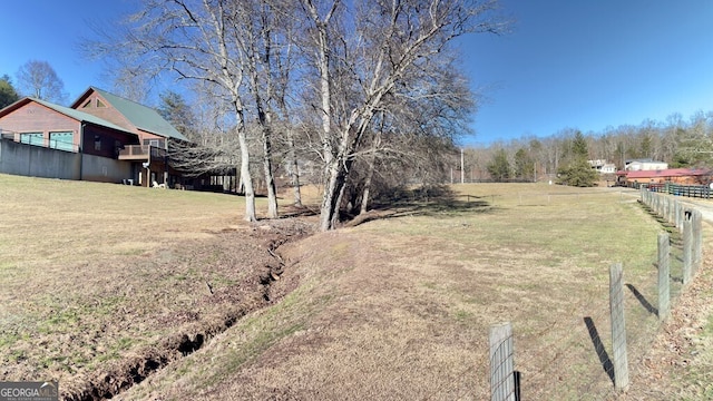 view of yard with fence