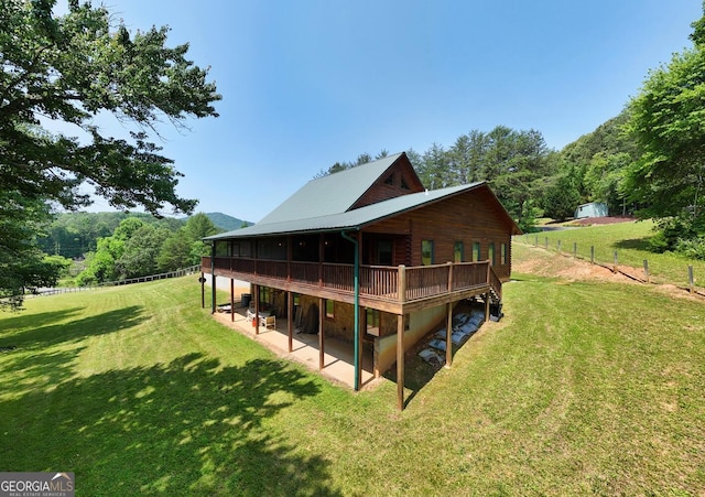 130 Stablegate Dr, Blairsville, GA 30512 - rear view of house with a patio, a deck, and a wooded view
