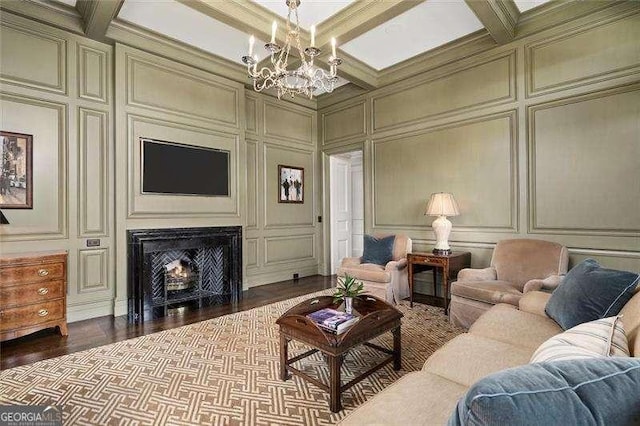 living room with beamed ceiling and a chandelier