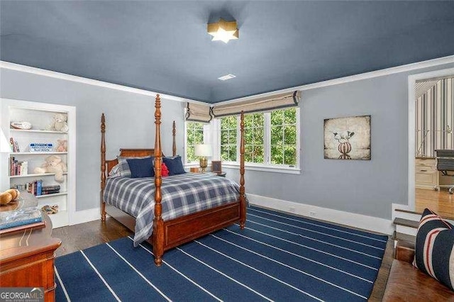 bedroom with crown molding