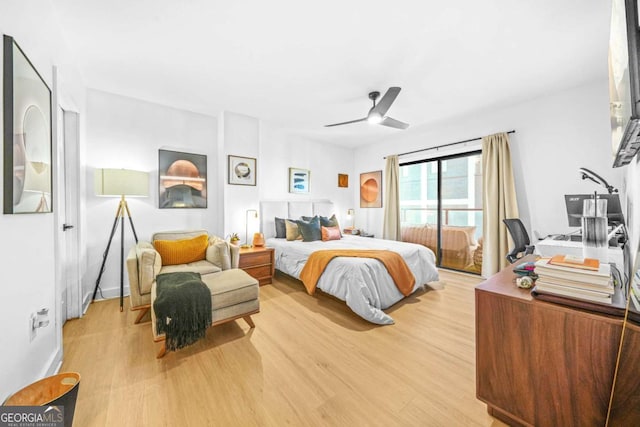 bedroom featuring ceiling fan and light hardwood / wood-style flooring