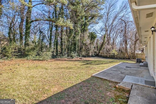 view of yard with a patio area and cooling unit