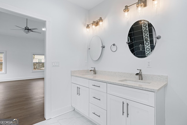 bathroom featuring vanity and ceiling fan