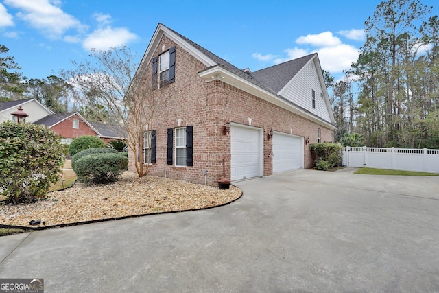 view of home's exterior with a garage