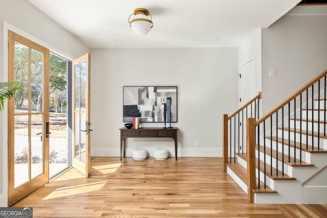 interior space featuring light hardwood / wood-style flooring and french doors