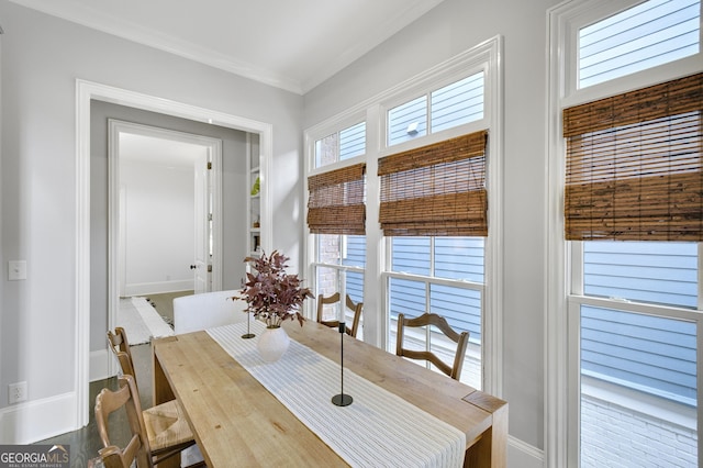 dining room with crown molding