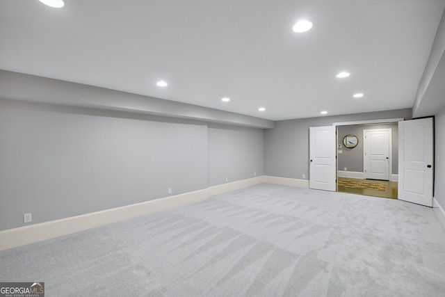 basement with light carpet