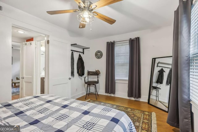 785 Ponce De Leon Pl NE Unit 8, Atlanta, GA 30306 - bedroom with wood finished floors and a ceiling fan