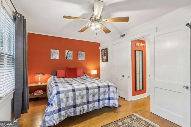 785 Ponce De Leon Pl NE Unit 8, Atlanta, GA 30306 - bedroom featuring wood finished floors and ceiling fan