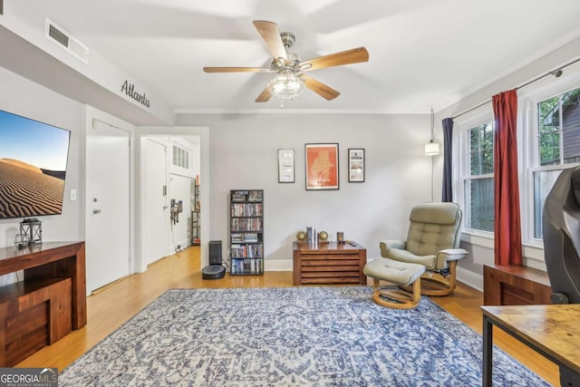 785 Ponce De Leon Pl NE Unit 8, Atlanta, GA 30306 - sitting room with ceiling fan and wood finished floors