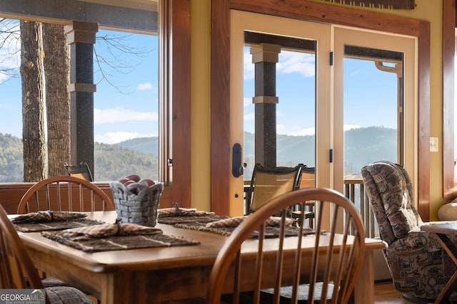 dining space with a mountain view