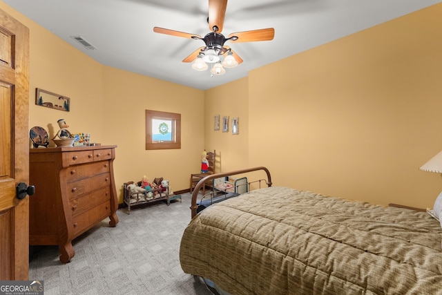 carpeted bedroom with ceiling fan