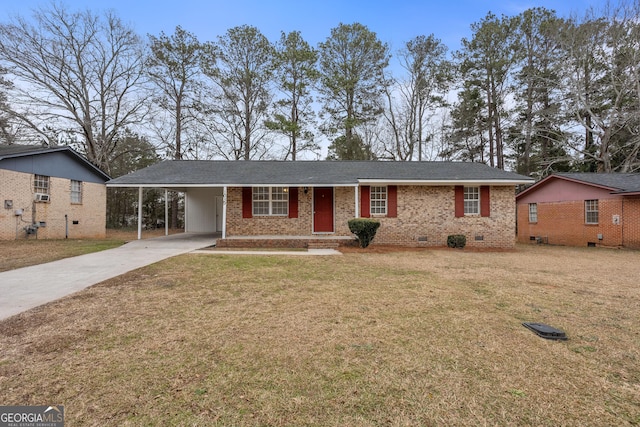 ranch-style house featuring a front yard and a carport