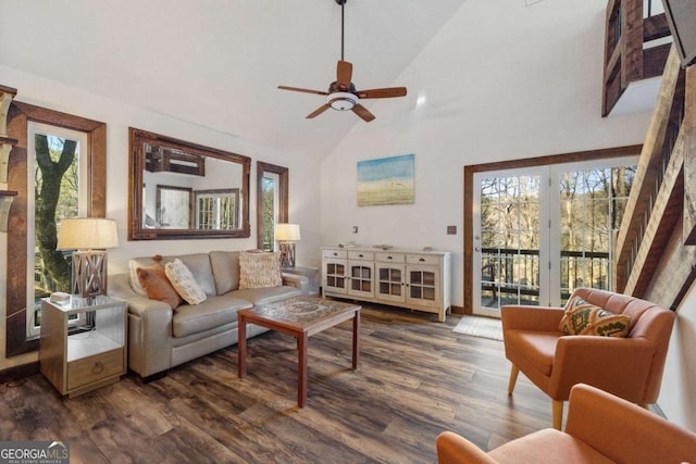 living room featuring high vaulted ceiling, dark hardwood / wood-style flooring, and ceiling fan