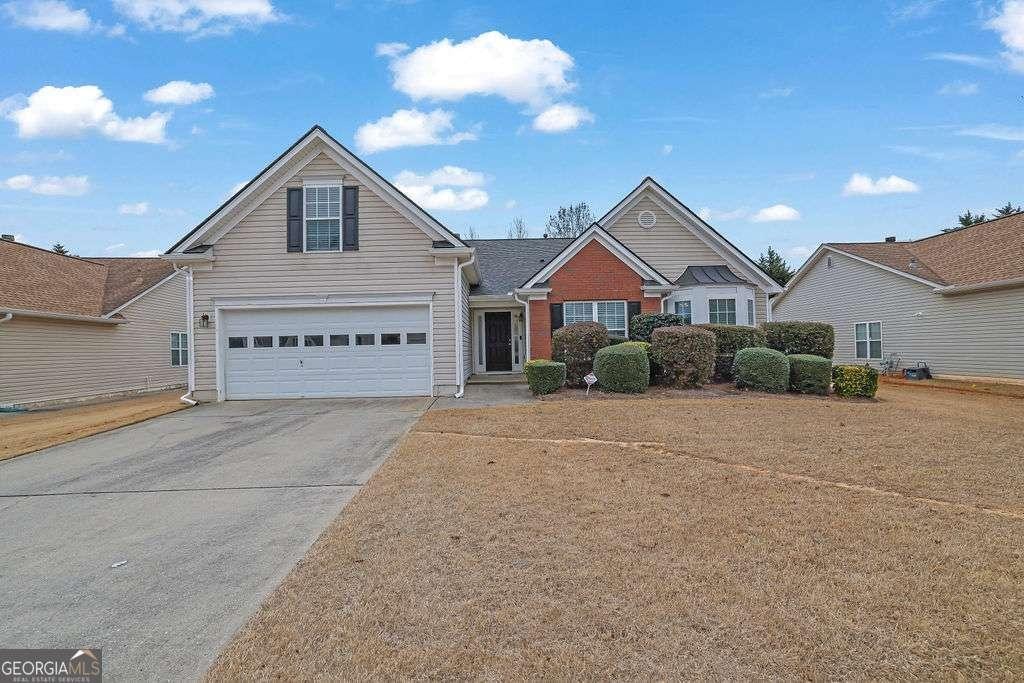 front of property with a garage