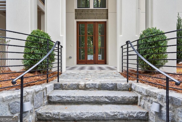 doorway to property featuring french doors