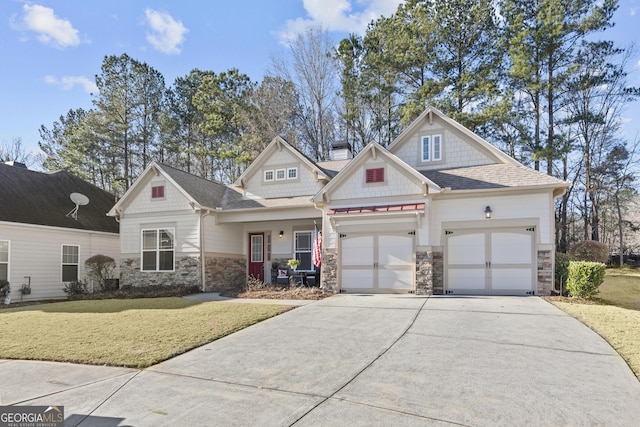 craftsman inspired home with covered porch and a front lawn