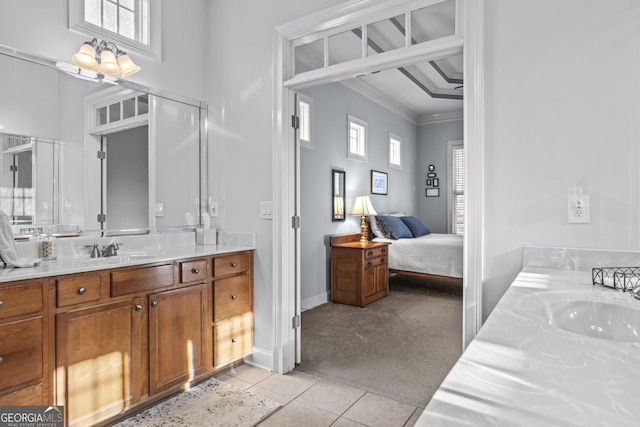 bathroom featuring vanity, tile patterned floors, and ornamental molding