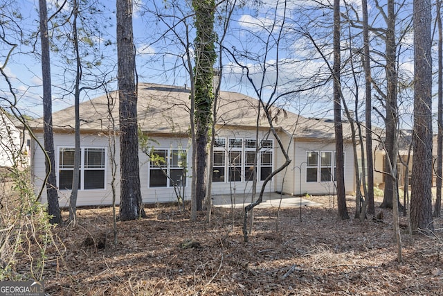 back of property featuring a patio area