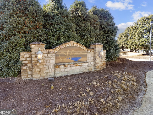 view of community sign