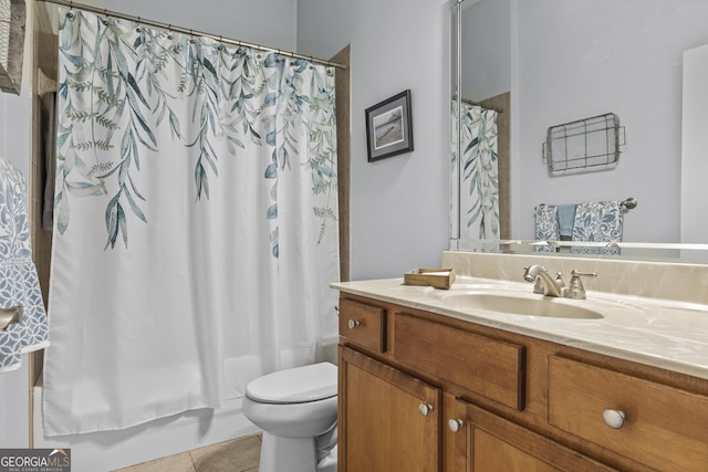 full bathroom with vanity, toilet, tile patterned floors, and shower / tub combo with curtain