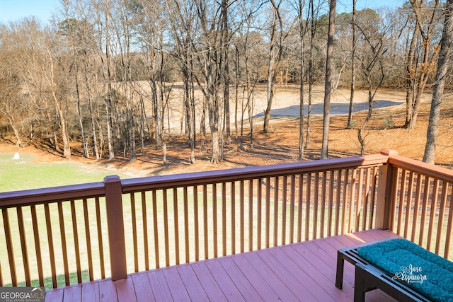 wooden deck with a yard