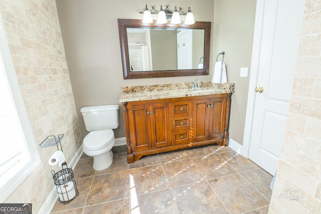 bathroom featuring tile patterned floors and vanity