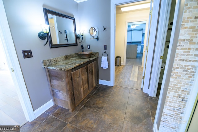 bathroom featuring vanity and tile patterned flooring