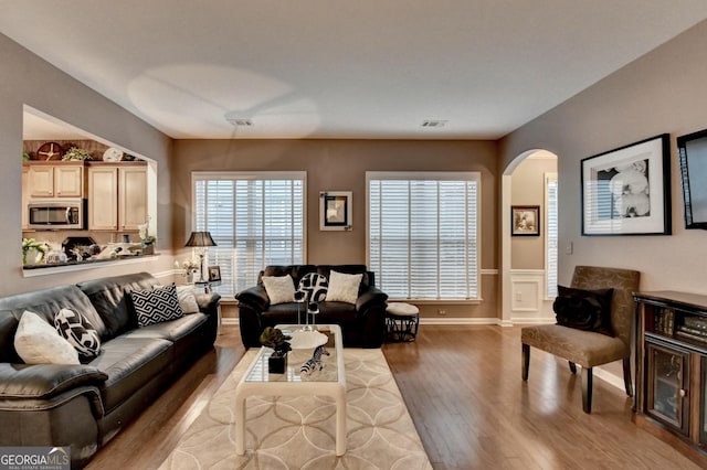 living room featuring light wood-type flooring