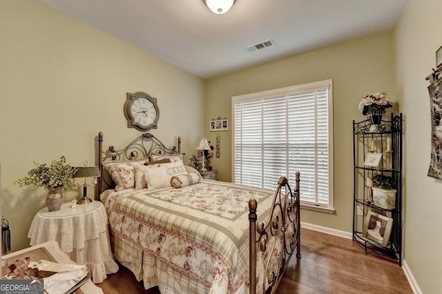 bedroom featuring hardwood / wood-style floors